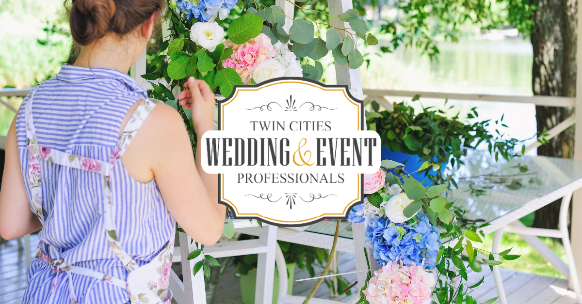 Florist making wedding arch in the Twin Cities with TCWEP Logo