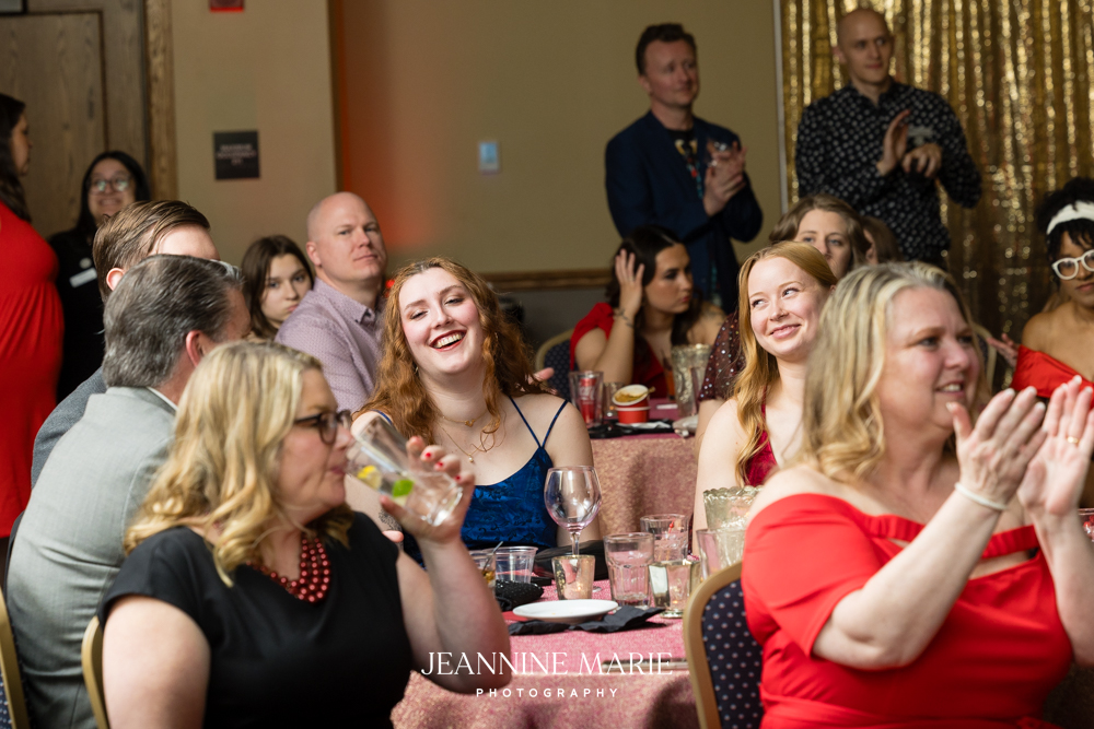 Smiling crowd at Twin Cities Wedding & Event Professionals Red Gala